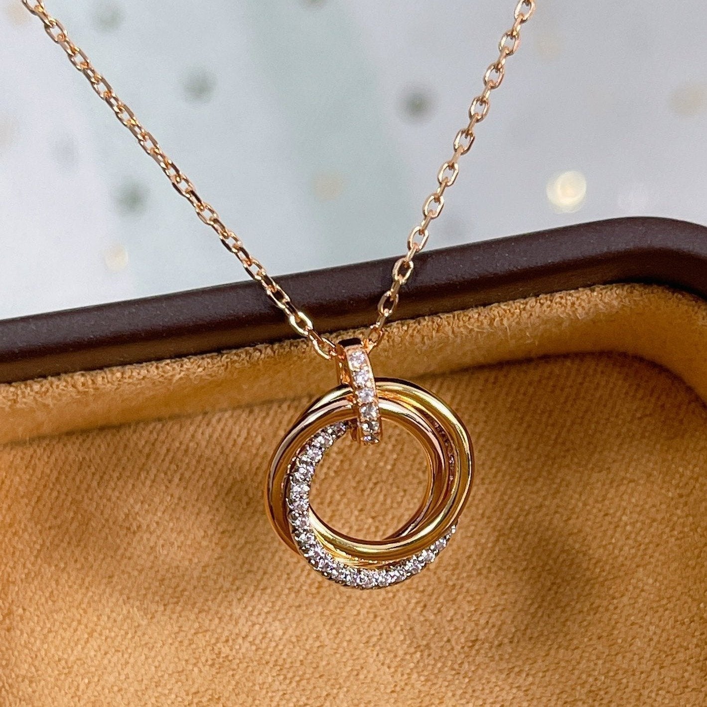 ¡®Lumi¡¯TRINITY NECKLACE SILVER GOLD PINK GOLD DIAMONDS
