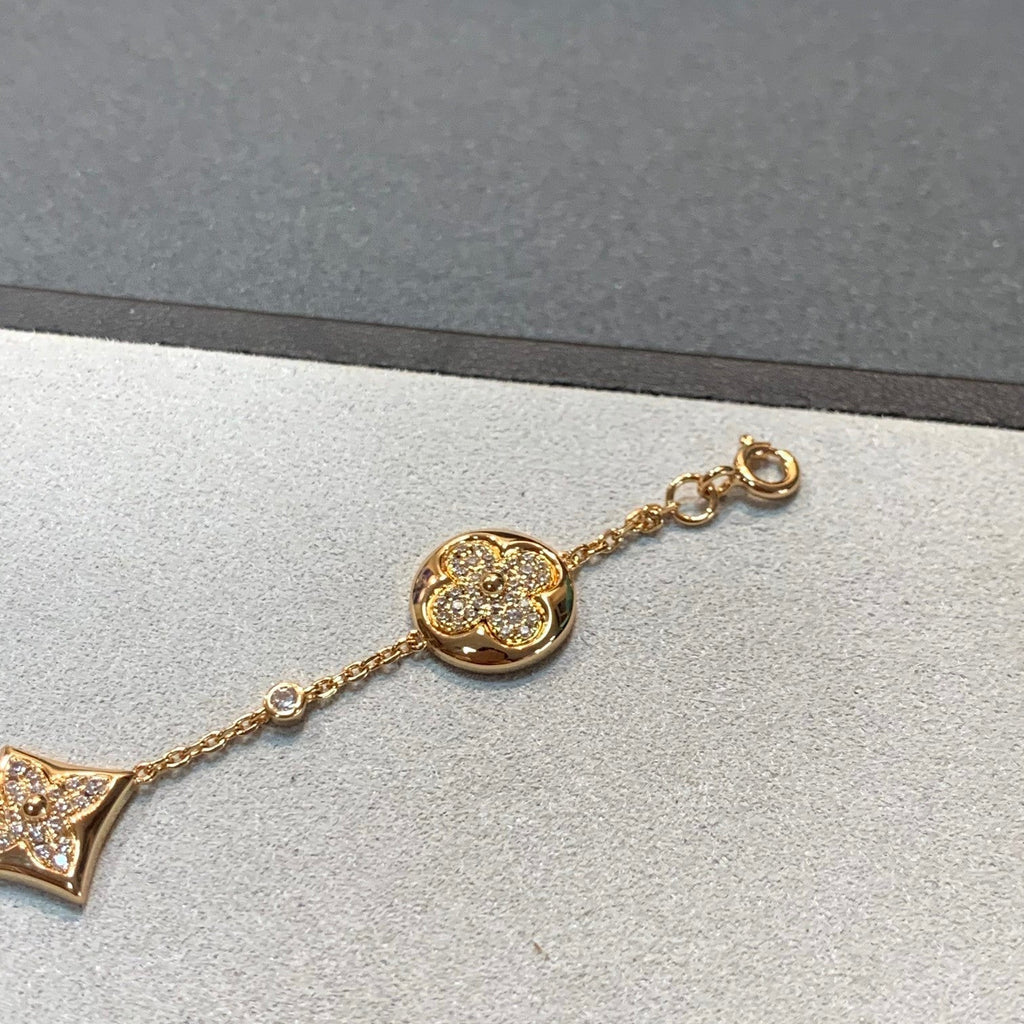 ¡®Lumi¡¯STAR AND SUN 4 MOTIFS GOLD DIAMONDS BRACELET