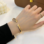 ¡®Lumi¡¯PANTHERE GOLD OPEN BRACELET
