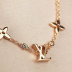 ¡®Lumi¡¯STAR AND SUN 7 MOTIFS GOLD BRACELET