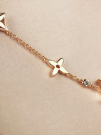 ¡®Lumi¡¯STAR AND SUN 7 MOTIFS GOLD BRACELET