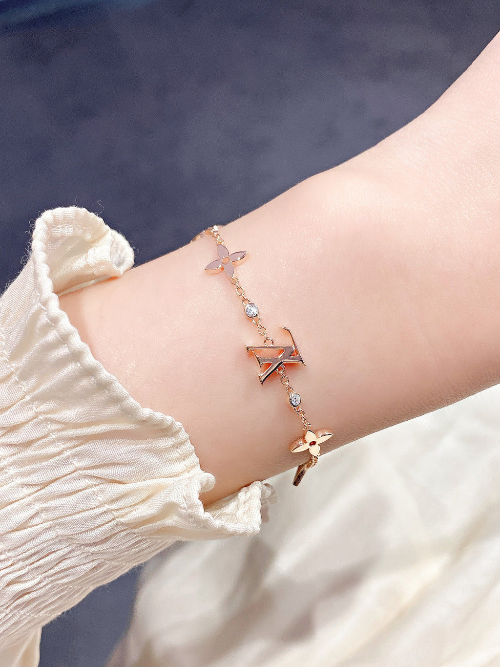¡®Lumi¡¯STAR AND SUN 7 MOTIFS GOLD BRACELET