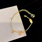 ¡®Lumi¡¯LOGO STAR MOTIF GOLD BRACELET