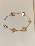 ¡®Lumi¡¯STAR AND SUN 5 MOTIF MOP PINK GOLD BRACELET