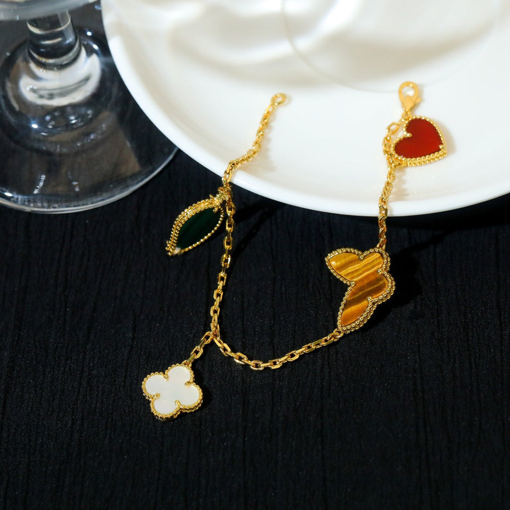 ¡®Lumi¡¯LUCKY SPRING 5 MOTIF GOLD BRACELET