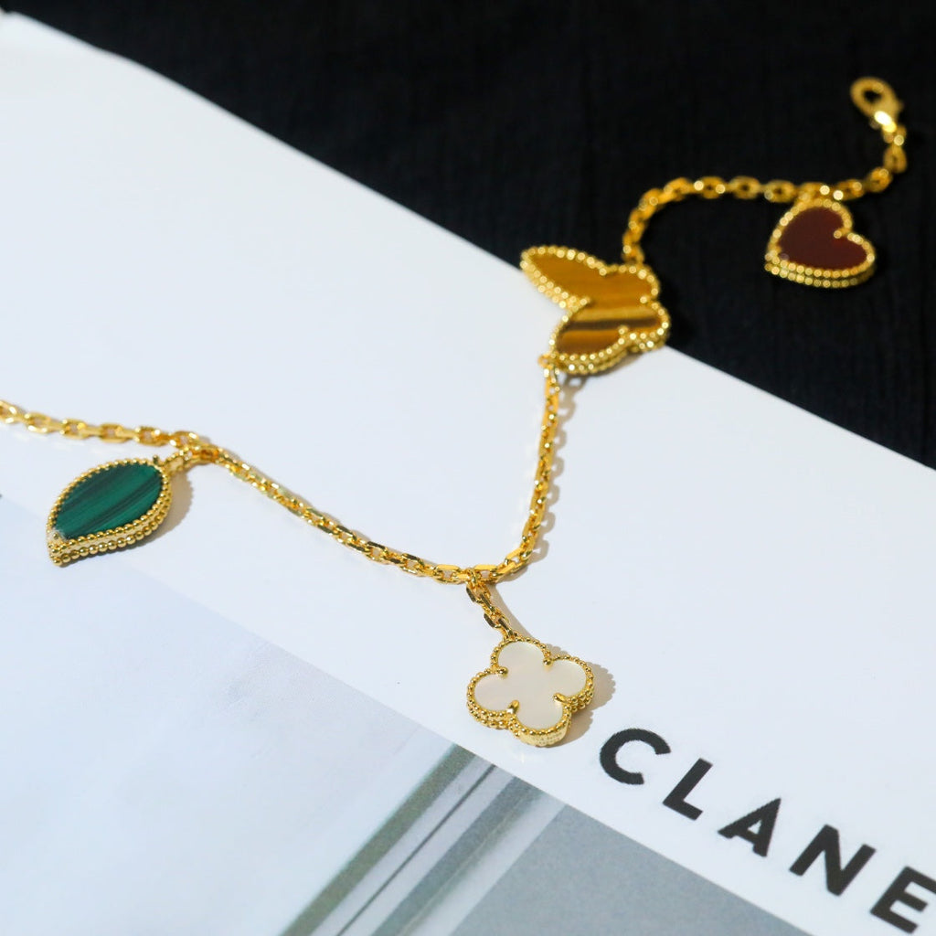 ¡®Lumi¡¯LUCKY SPRING 5 MOTIF GOLD BRACELET
