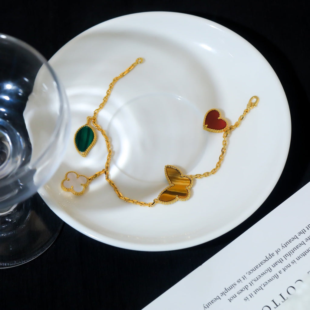 ¡®Lumi¡¯LUCKY SPRING 5 MOTIF GOLD BRACELET