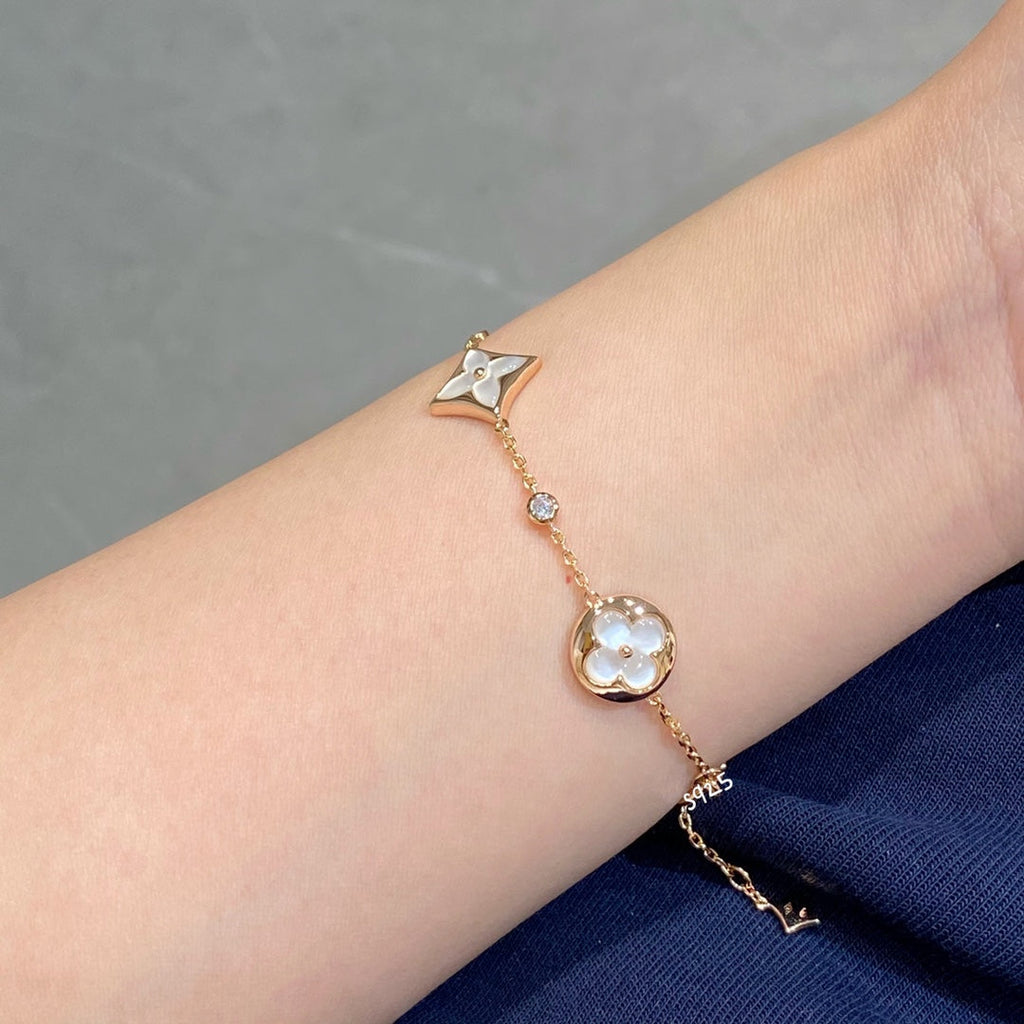 ¡®Lumi¡¯STAR AND SUN 4 MOTIF WHITE MOP PINK GOLD BRACELET