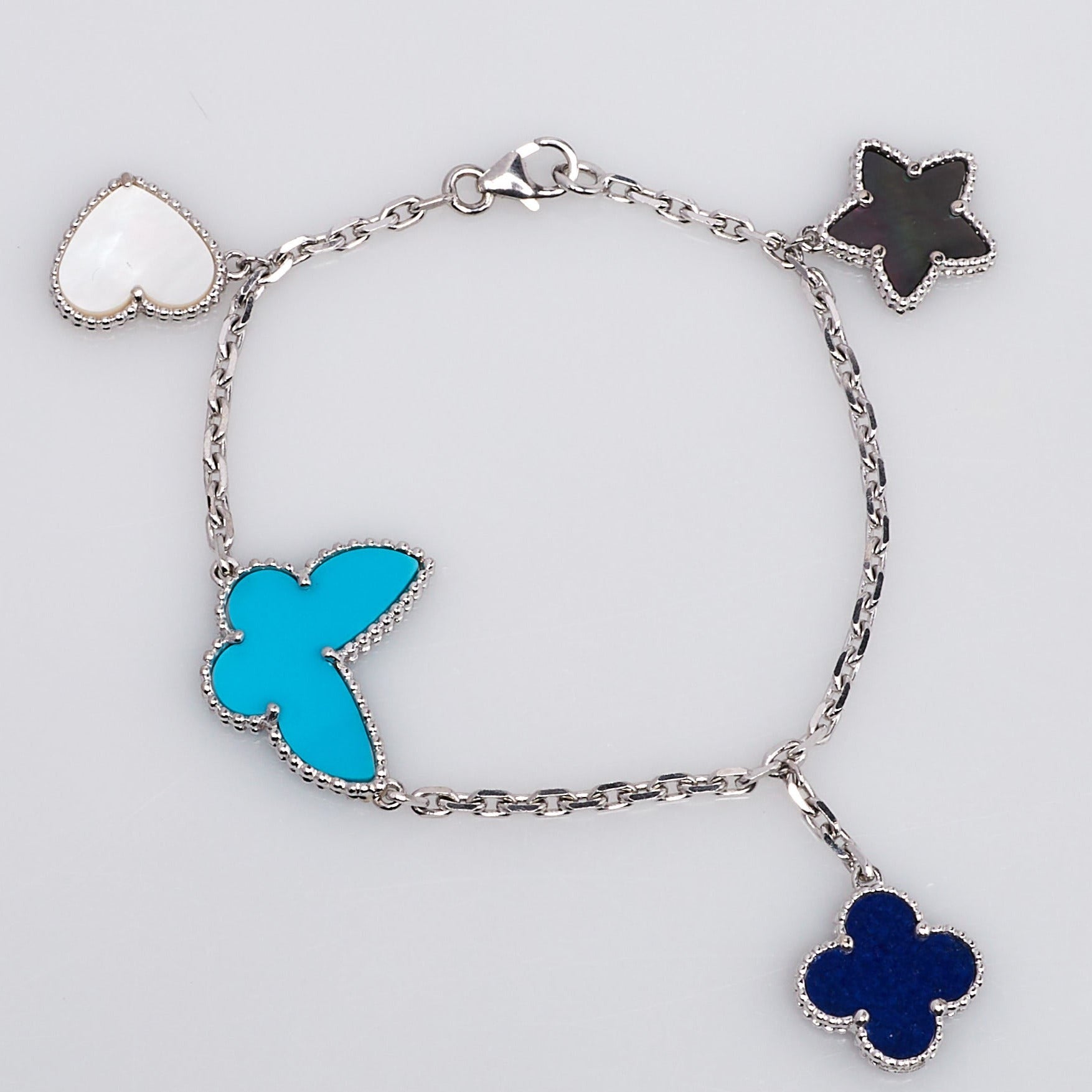 ¡®Lumi¡¯LUCKY SPRING SILVER BRACELET 4 MOTIF