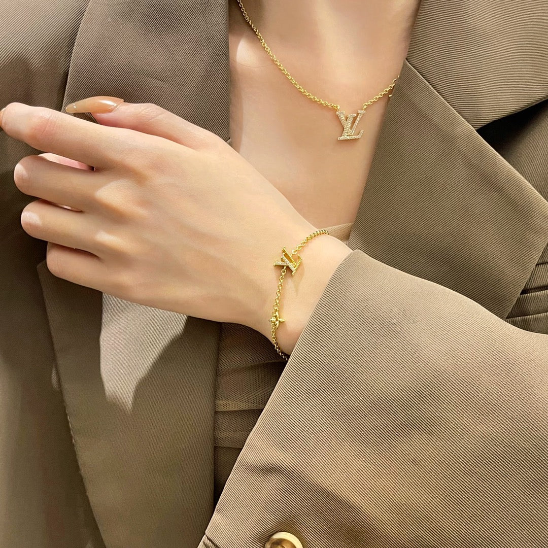 ¡®Lumi¡¯LOGO STAR MOTIF GOLD BRACELET
