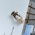 ¡®Lumi¡¯FORCE LARGE HORSESHOE BLACK WHITE DIAMOND BRACELET ROSE GOLD