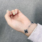 ¡®Lumi¡¯CLOVER 5 MOTIF VEINED ONYX BRACELET SILVER