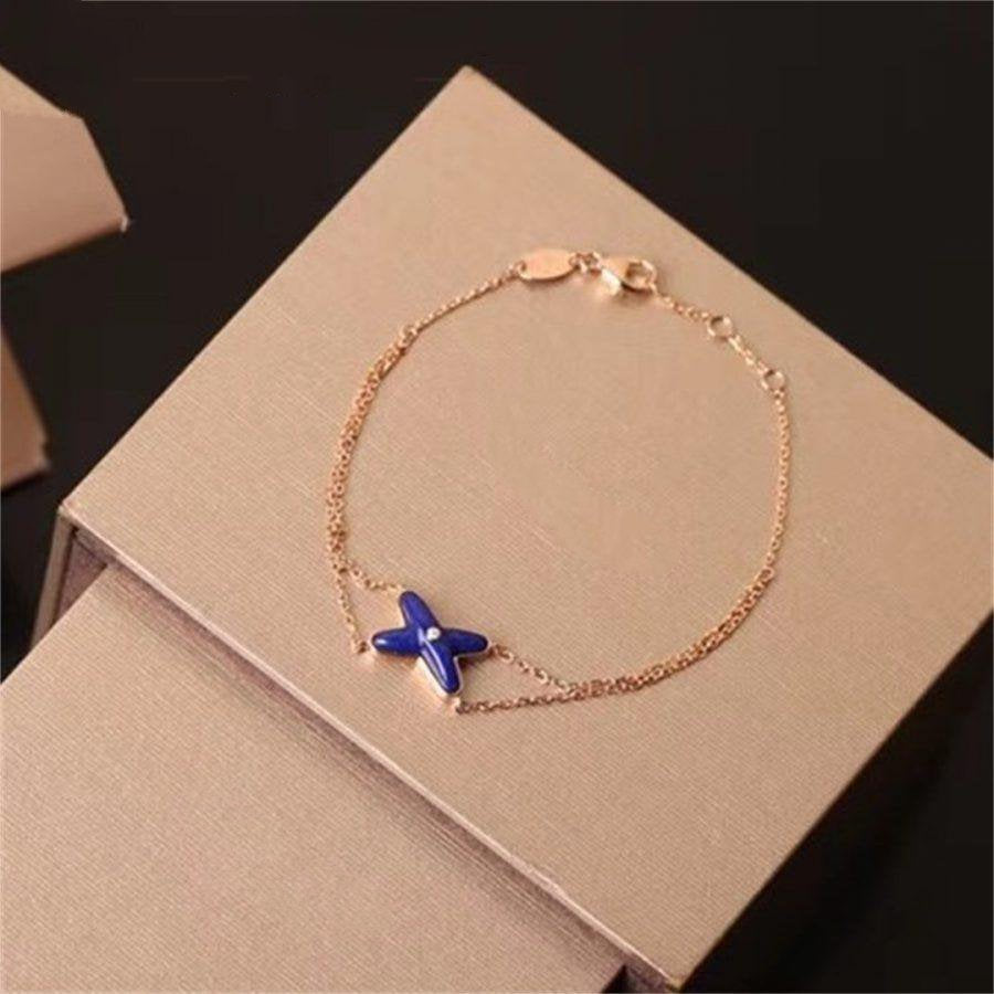 ¡®Lumi¡¯Hollow Design Four-Leaf Clover Flower Shape Ring
