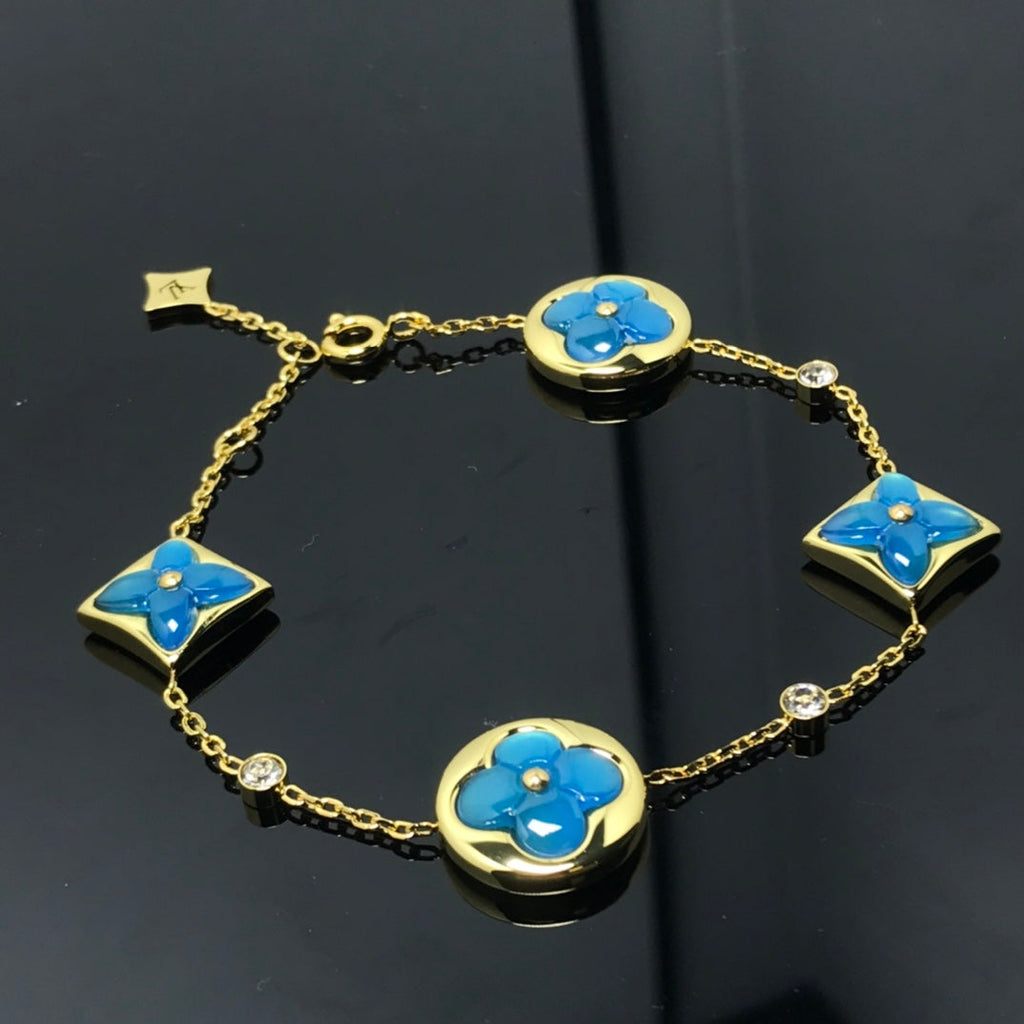 ¡®Lumi¡¯STAR AND SUN 4 MOTIF BLUE BRACELET